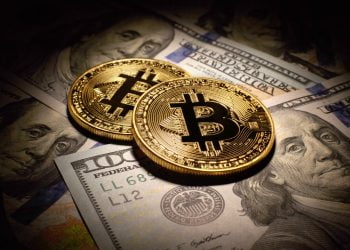 Golden Bitcoins Coins and dollar bills