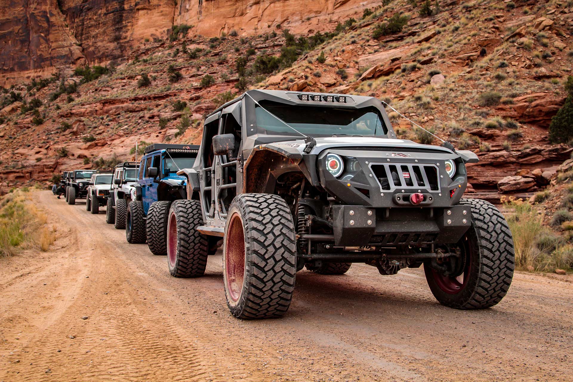 Off-road vehicles in a line