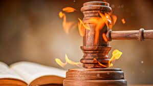 law gavel on fire