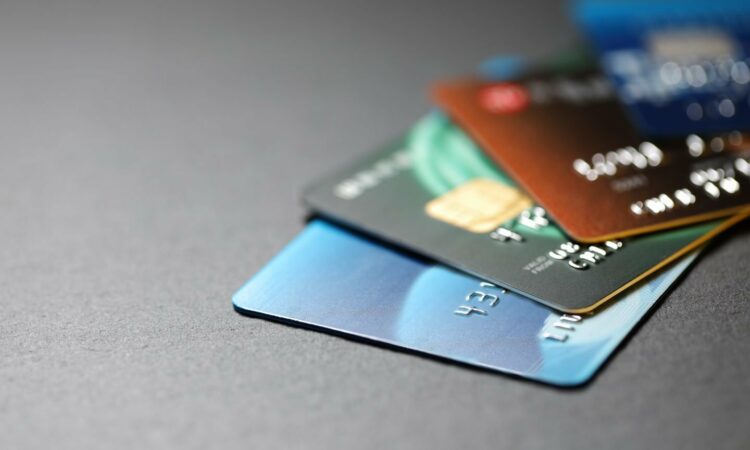 Should You Get a Credit Card? X Pros, Cons, and Options