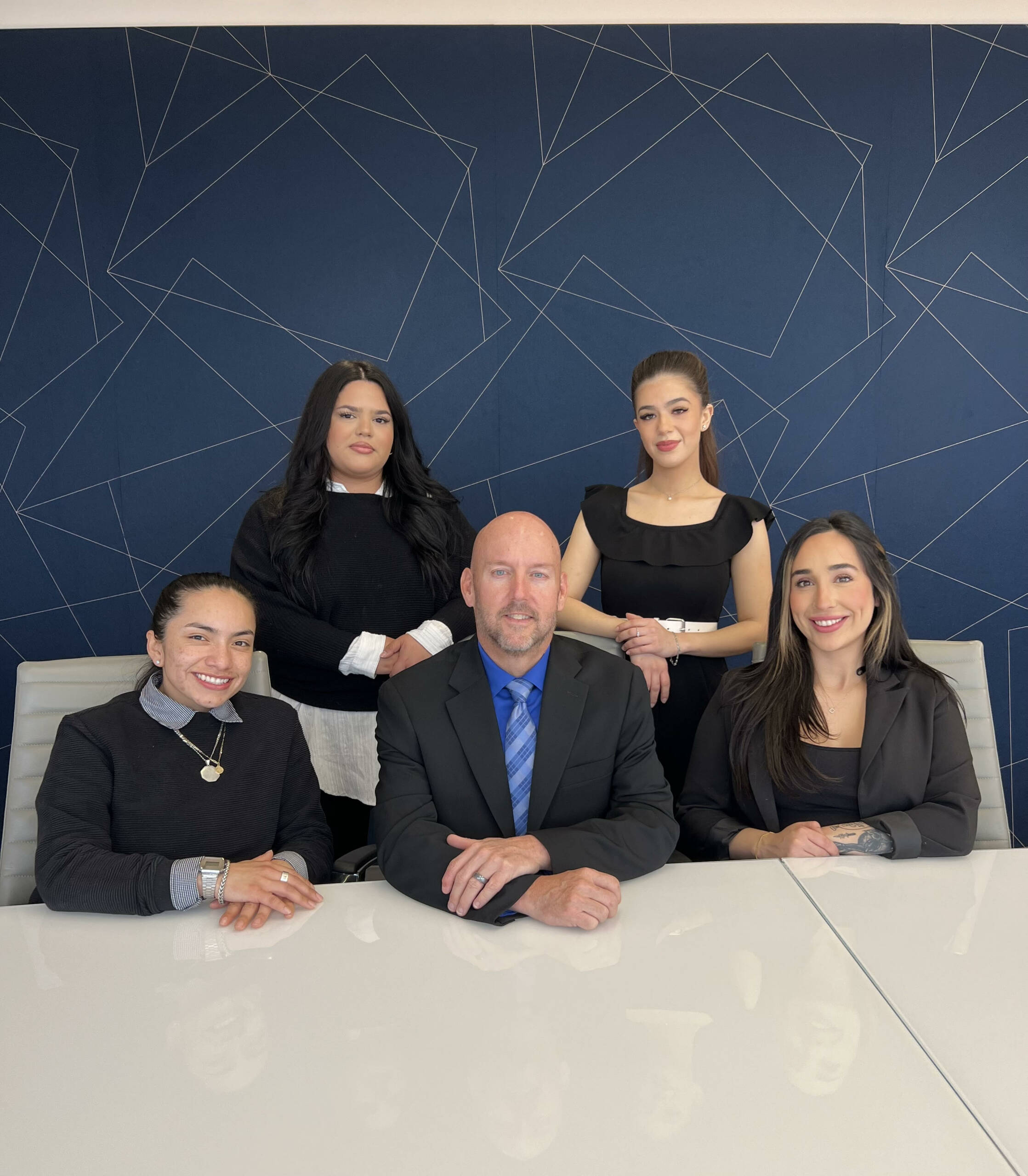 Phoenix Law Managing Attorney Ty Carss, Esq. and his staff