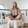 woman meditating indoor