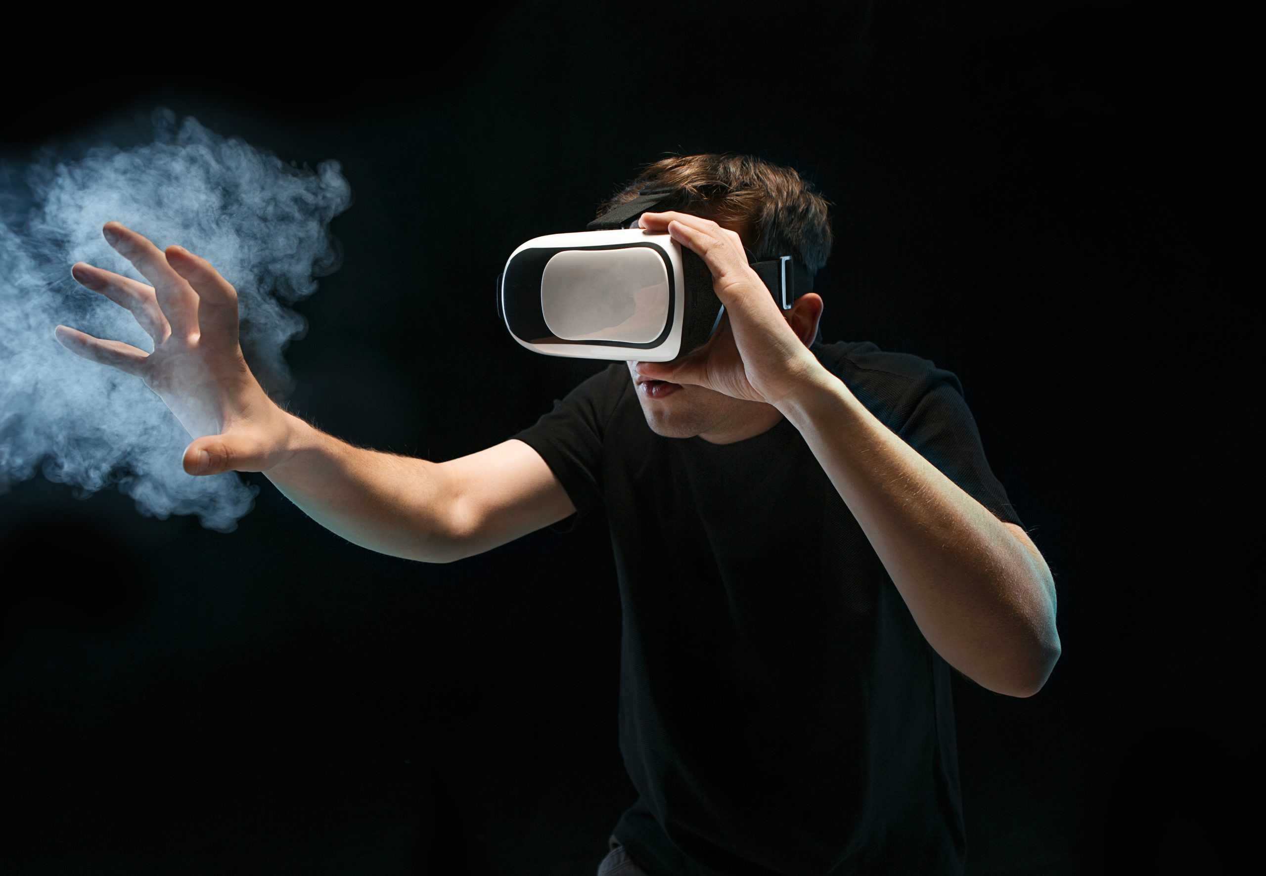 man with glasses virtual reality future technology concept scaled