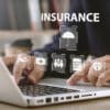 online insurance Businessmen use computers to make insurance online. For travel, cars, finance, health, life and family. insurance concept