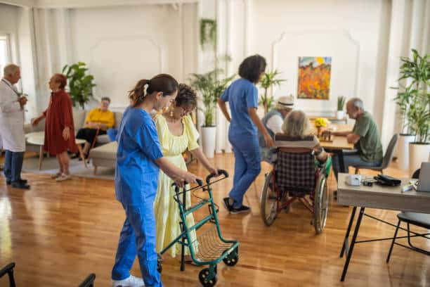 Usual day in crowded nursing home, healthcare workers working with senior people in nursing home