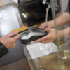 person paying using nfc technology