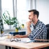 Successful freelancer working on computer while staying at home